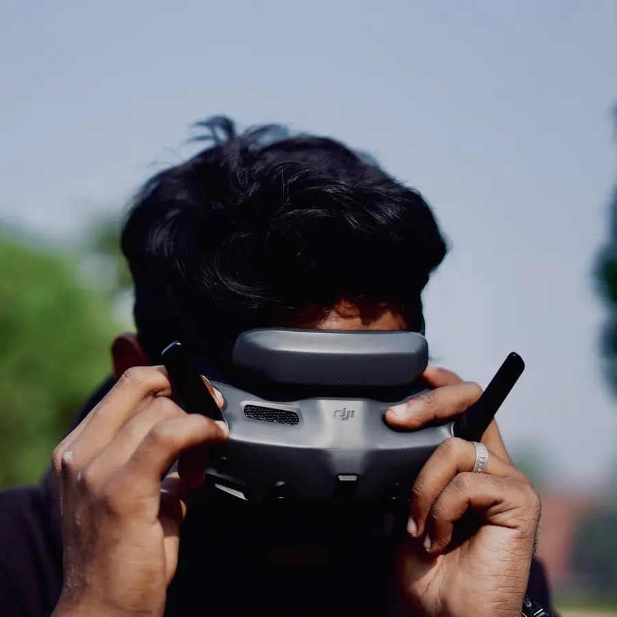 Pilot putting on FPV goggles